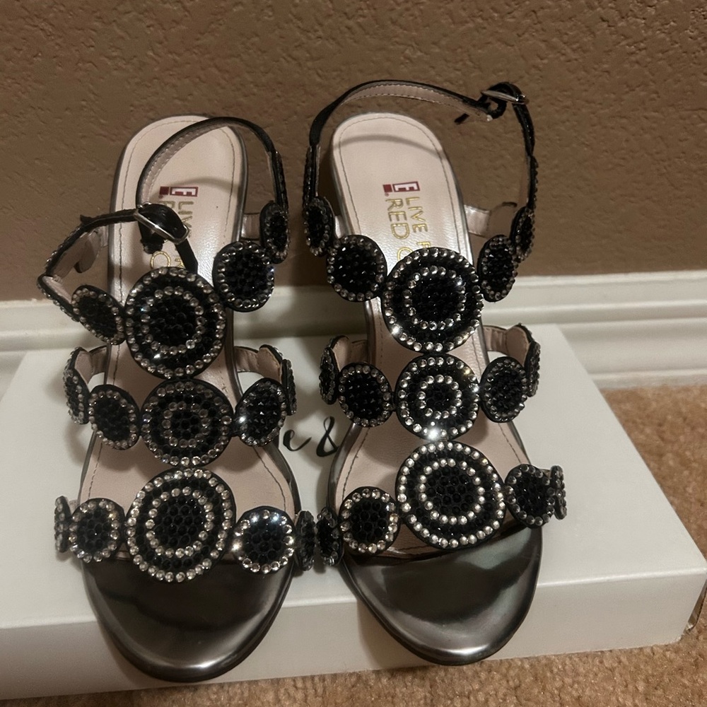 Black Sandals with Medallion Ornaments and Shiny Finish